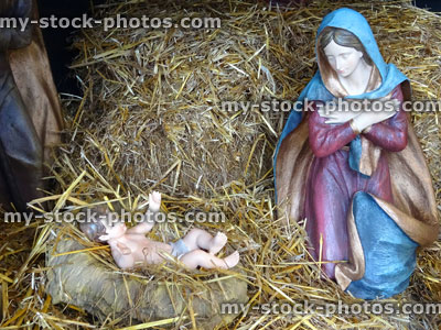 Stock image of large model Christmas nativity scene, Mary, baby Jesus crib, stable
