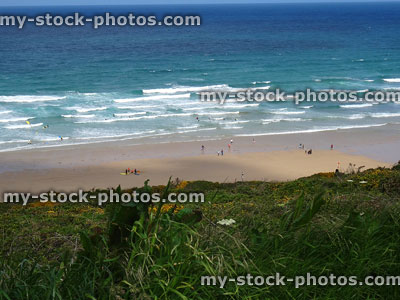 Stock image of surfers having surfing lesson on Newquay beach, Cornwall