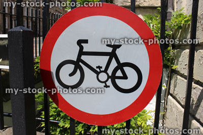 Stock image of English 'No Cycling' sign, with red / white circle