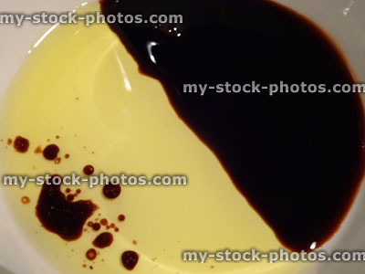 Stock image of olive oil and balsamic vinegar mixture, yin and yang