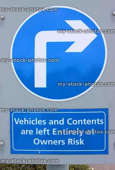 Stock image of right turn arrow sign / signal in car park, this way