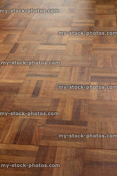 Stock image of wooden parquet flooring squares, varnished wood floor tiles