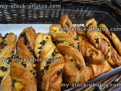 Stock image of freshly baked, custard / currant Danish puff pastry twists