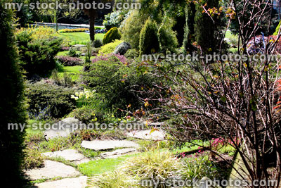 Stock image of stepping stones pathway in landscaped Japanese garden