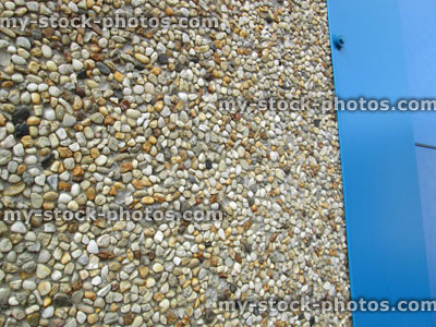 Stock image of roughcast / pebbledash, wall texture background, small pebbles, plaster cement render