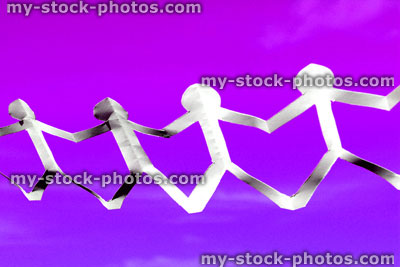 Stock image of white people paper chain of dolls, men holding hands, purple background