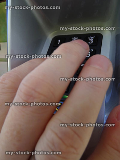Stock image of chip and pin machine numbers, credit card payment, hiding code