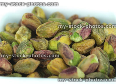 Stock image of shelled pistachio seeds / nuts, healthy eating snackfood with health benefits
