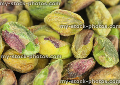 Stock image of shelled pistachio seeds / nuts close up, protein, vitamins, minerals