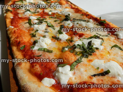 Stock image of homemade cheese and tomato margherita pizza, Italian restaurant, pizza crust