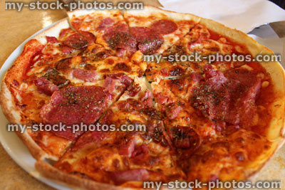 Stock image of homemade pepperoni meat feast pizza (close up)