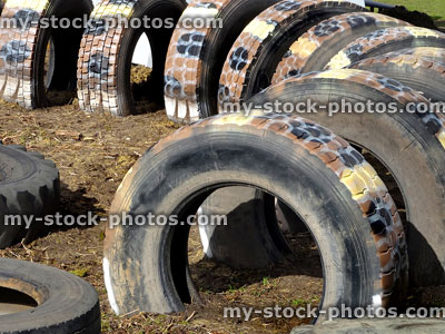 Stock image of children's playground with tunnel made from tractor tyres