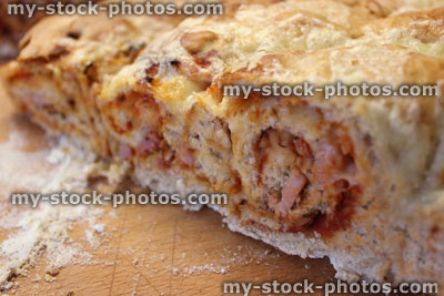 Stock image of homemade savoury povitica bread, pizza bread swirls with cheese topping