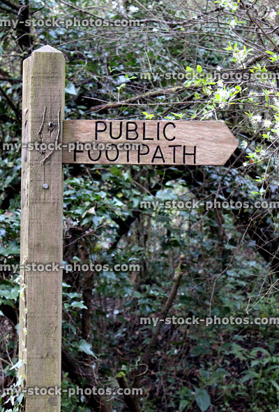 Stock image of wooden public footpath sign in the countryside