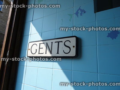 Stock image of public toilet entrance for men, gents toilets sign