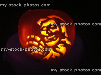 Stock image of carved pumpkin in shape of Halloween skeleton