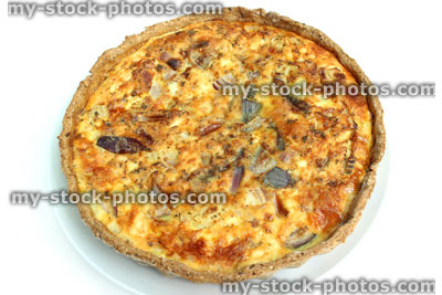 Stock image of homemade bacon quiche lorraine tart / savoury bacon and egg flan