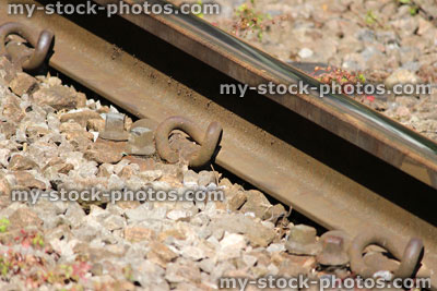 Stock image of railway line rail and gravel, metal railroad track