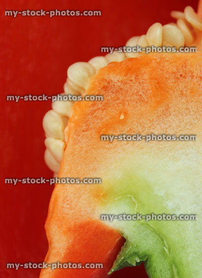 Stock image of large red pepper / capsicum, cross section, cut in half, placenta, seeds