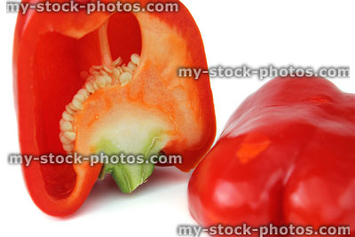 Stock image of red pepper / capsicum, cross section, cut into two halves