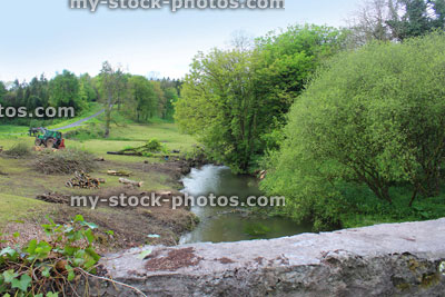 Stock image of river bank being cleared after flooding and dredging