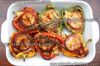 Stock image of roasted stuffed peppers, topped with breadcrumbs and cheese, vegetarian dish