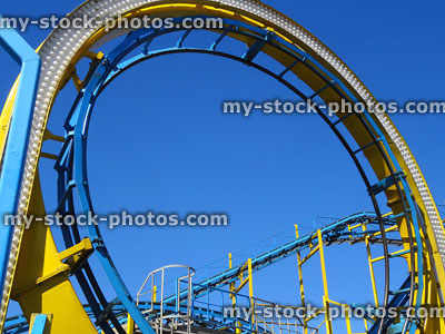 Stock image of vertical loop on metal corkscrew rollercoaster circular track