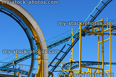 Stock image of rollercoaster train tracks, slopes and loop the loop