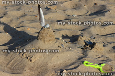 Stock image of sandcastle on beach, sand castles made on seaside holiday