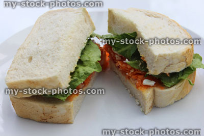 Stock image of ham, cheese and salad sandwich with white bread