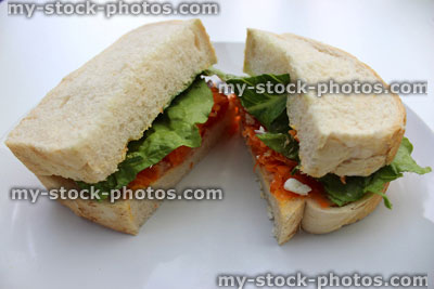 Stock image of ham, cheese and salad sandwich with white bread