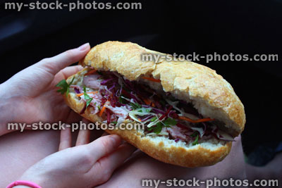 Stock image of ham salad sandwich (sub / submarine sandwich), freshly baked baguette