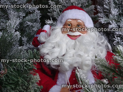 Stock image of large toy Santa Claus with bushy white beard