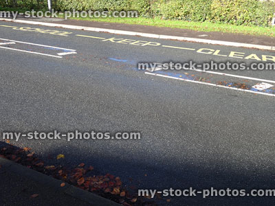 Stock image of school keep clear sign / zigzag lines on road