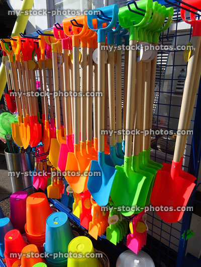 Stock image of beach shop selling rainbow buckets, spades, fishing nets