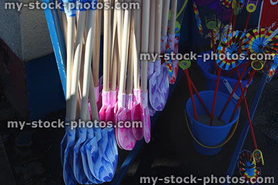 Stock image of blue and purple seaside buckets and spades, beach shop