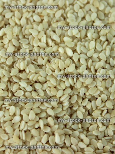 Stock image of sesame seeds heaped in dish, vitamins, minerals, zinc