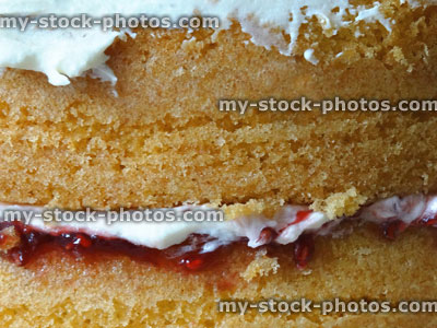 Stock image of Victoria sponge cake with strawberry jam, fresh cream, butter icing