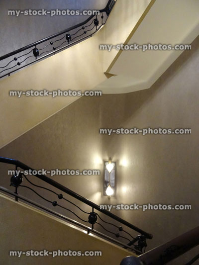 Stock image of angular stairs / staircase, black art deco metal bannister, wrought iron staircase balustrading ironwork