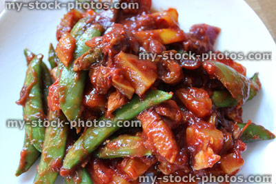 Stock image of homemade sweet and sour chicken stir fry, vegetables