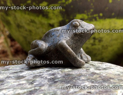 Stock image of grey stone frog ornament