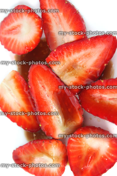 Stock image of sliced strawberries with balsamic vinegar and sugar, healthy eating