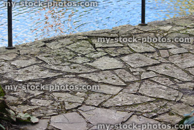 Stock image of crazy paving pathway, path of broken concrete slabs