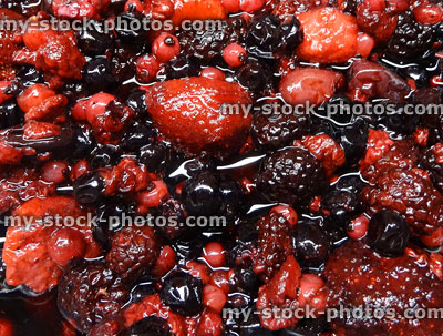 Stock image of glass bowl filled with summer fruit / berries, strawberries, blackberries, redcurrants
