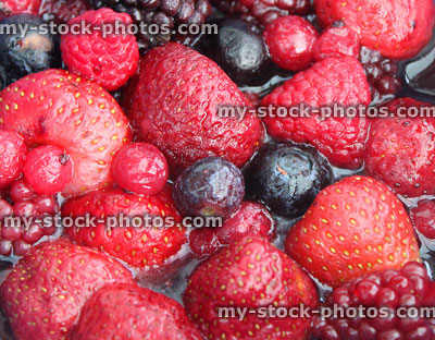 Stock image of summer fruit berries in juice, healthy breakfast food