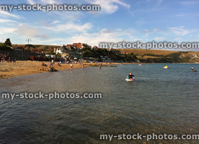 Stock image of summer holiday scene at English seaside beach, Swanage