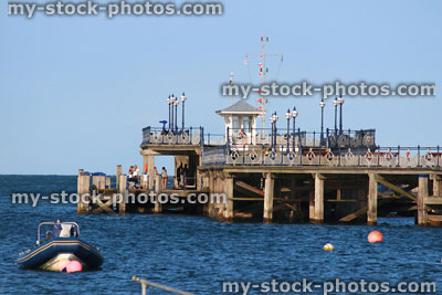 Stock image of historic pier in sea at Swanage, English seaside town