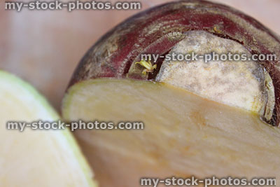Stock image of fresh swedes (rutabaga / Swedish turnip), sliced in half