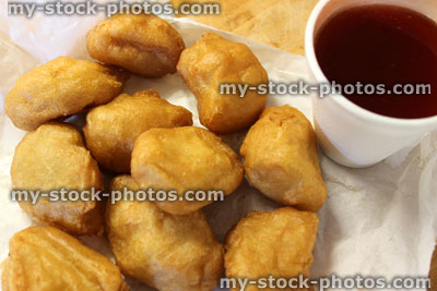Stock image of chicken balls, sweet and sour sauce, Chinese takeaway