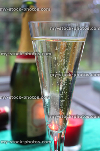 Stock image of sparkling white wine in champagne flute glass / bottle